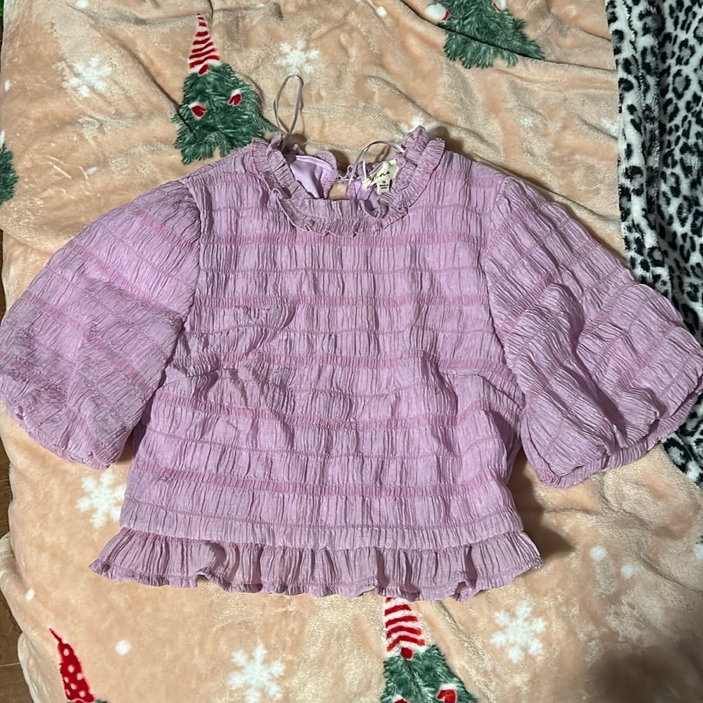 Purple puffy sleeved top! Size medium never worn